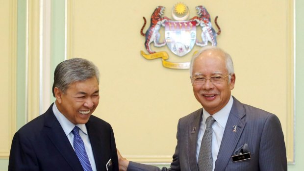 Malaysian Prime Minister Najib Razak (right) announces the appointment of new Deputy Prime Minister Ahmad Zahid Hamidi following a cabinet reshuffle last week.