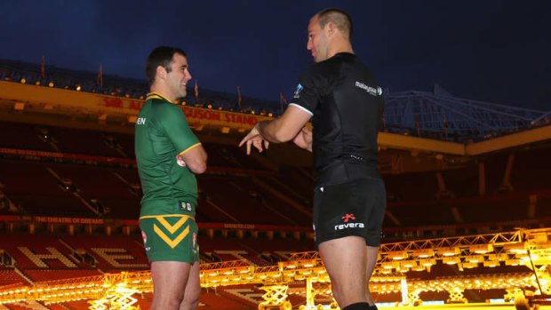 The final word: Australian captain Cameron Smith (left) and his Kiwi counterpart Simon Mannering at Old Trafford.