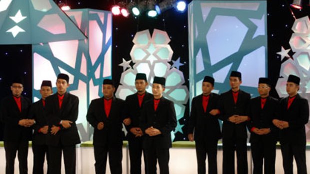 Mastering the mullah ... contestants during the filming of the Malaysian reality TV show Imam Muda or Young Leader.