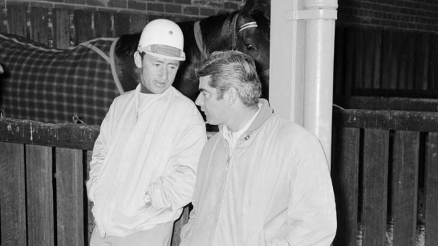 The prince who would be king ... Jockey Roy Higgins, standing, speaks with Bart Cummings, known then as the Black Prince but today as the Cups King.