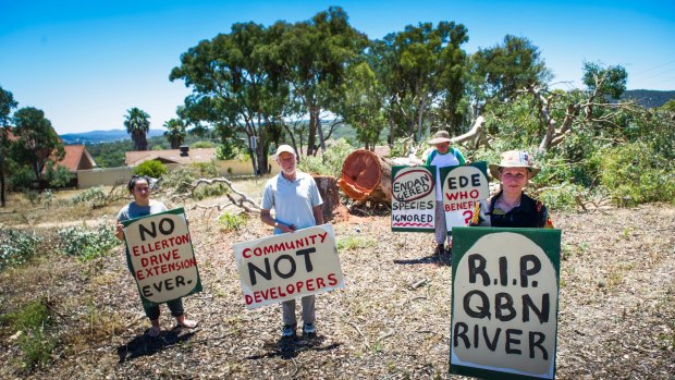 Protesters on Thursday gathered at the scene of tree-clearing for the Ellerton Drive Extension in Queanbeyan 