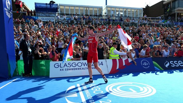 Time top spare: Alistair Brownlee of England savours his victory.