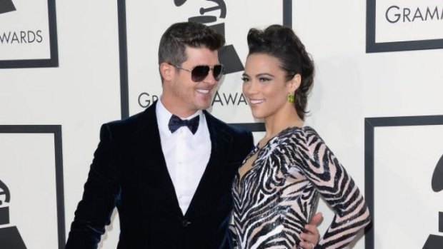 Robin Thicke with his now estranged wife Paula Patton at the 2014 Grammy Awards.