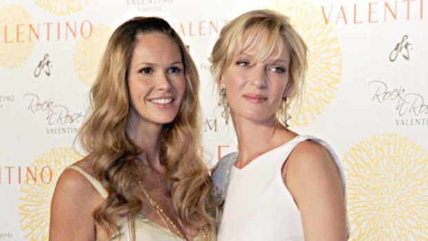 All in the family ... Elle Macpherson and Uma Thurman share care.