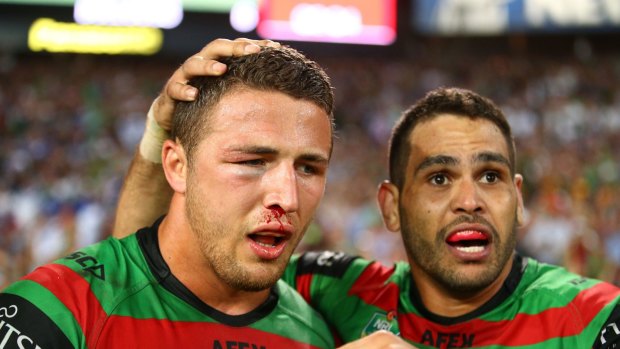 Heading back: Sam Burgess with Greg Inglis after winning the 2014 NRL Grand Final with the South Sydney Rabbitohs.