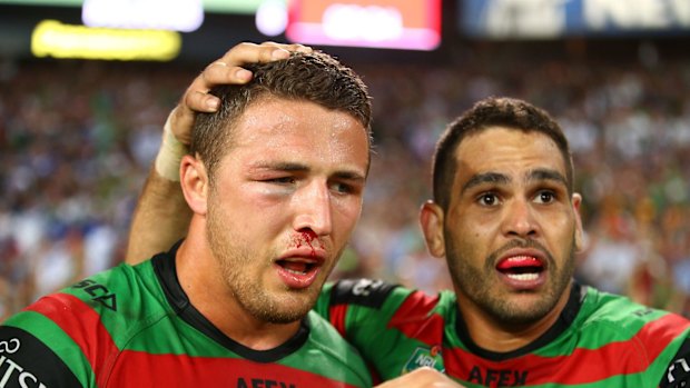 Heading back: Sam Burgess with Greg Inglis after winning the 2014 NRL Grand Final with the South Sydney Rabbitohs.