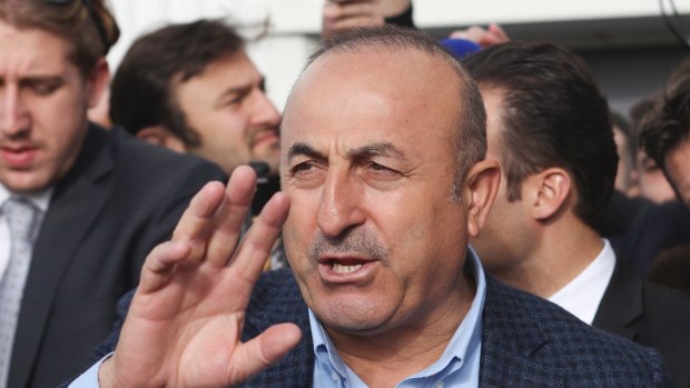 Turkish Foreign Minister Mevlut Cavusoglu at a rally in Metz, France on Sunday. Mr Cavusoglu was prevented from landing in Rotterdam for a Dutch rally.