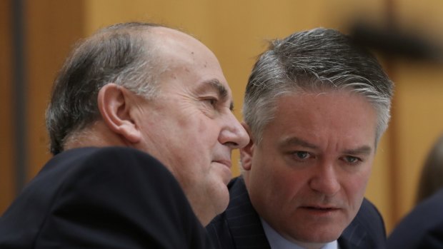 Treasury secretary John Fraser and Finance Minister Mathias Cormann during estimates at Parliament House.