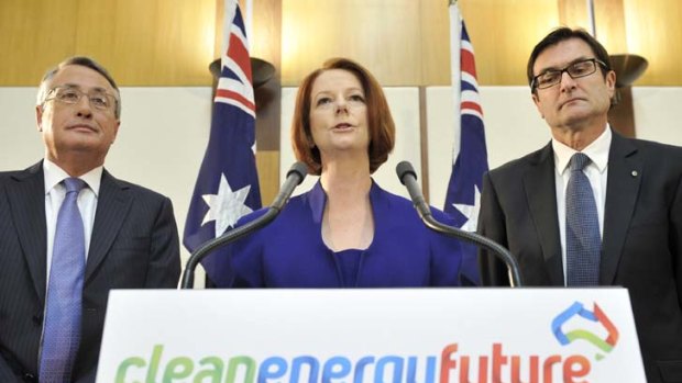 Standing firm ... from left, Treasurer Wayne Swan, Prime Minister Julia Gillard and the Minister for Climate Change Greg Combet.