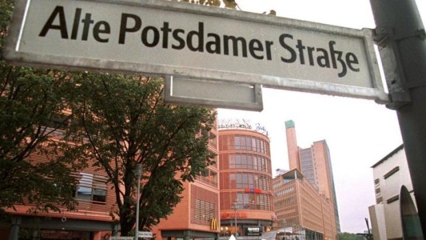 Business is booming: People walk in the newly constructed Potsdamer Platz complex.