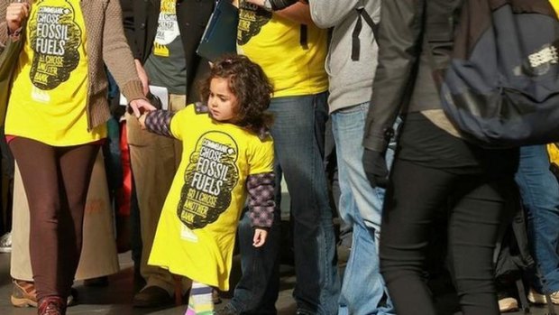 Green shoots: A young girl attends an anti-fossil fuels rally in Melbourne.