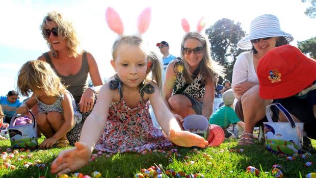 Four-year-old Chilie was intent on a feast at an Easter Egg hunt at Werribee Mansion.