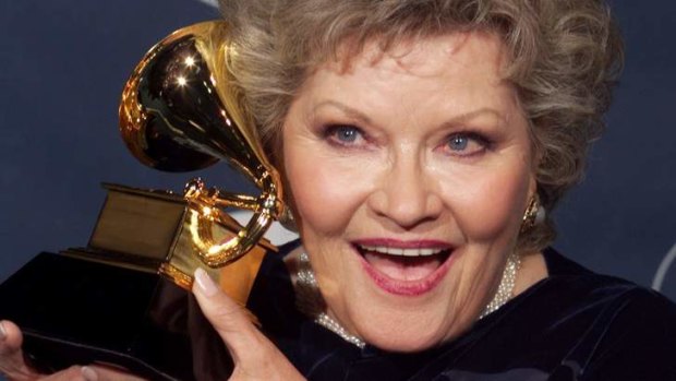 Singer Patti Page poses with the Grammy Award she won for Best Traditional Pop Vocal Performance for  Live At Carnegie Hall-The 50th Anniversary Concert during the 41st Grammy Awards in 1999.