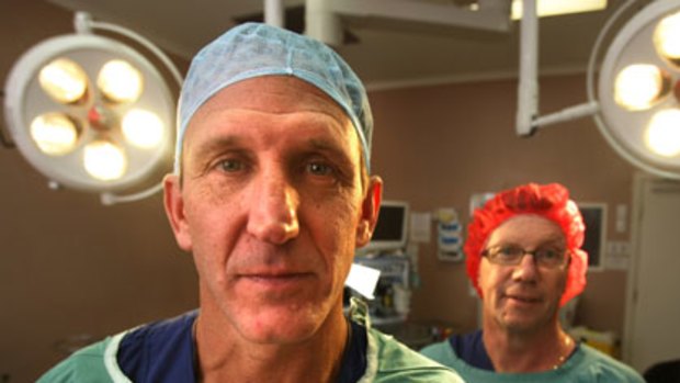 "Impressive" ... Dr Paul Perito heads into surgery with Dr Chris Love in Melbourne.