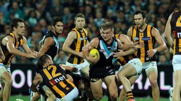 Coming through: Port Adelaide’s Ollie Wines bursts clear during the win over Hawthorn on Saturday night.
