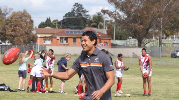 "It's good to go back to where you are from and work with the kids" ... Israel Folau.