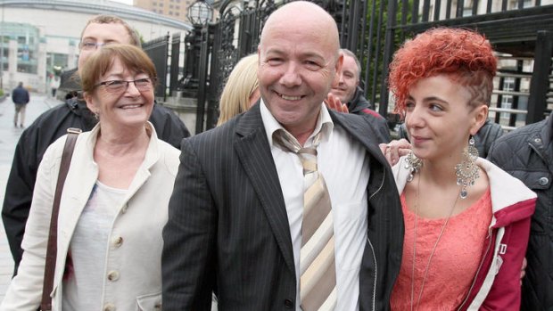 Liam Holden, now 58, with family outside the Court of Appeal in Belfast.