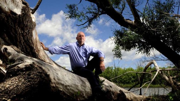 Calm before the storm ... Craig Knowles at the Molongolo Reach in Canberra which feeds into Lake Burley Griffin.