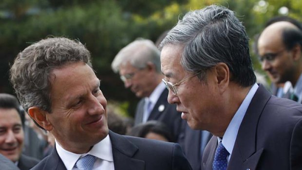 U.S. Treasury Secretary Timothy Geithner, left, with People's Bank of China Governor Zhou Xiaochuan.