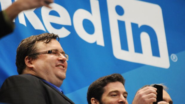 LinkedIn founder Reid Garrett Hoffman (L) and CEO Jeff Weiner just before ringing the opening bell of the New York Stock Exchange.