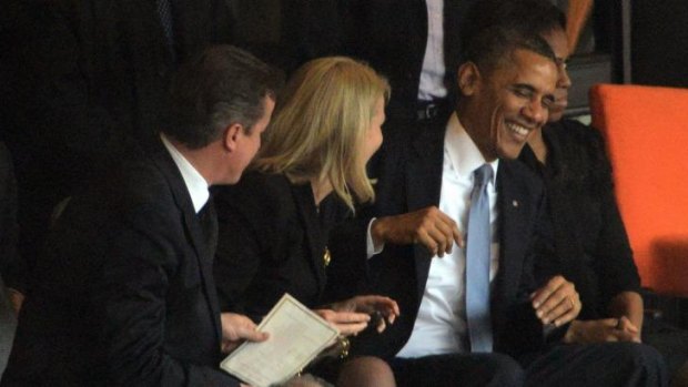 Having fun: Obama jokes with his fellow leaders.