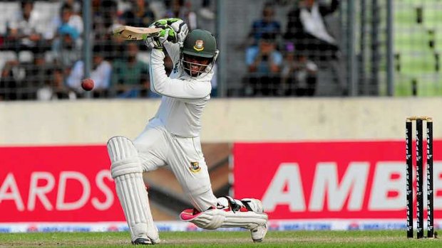 Unbeaten century: Mominul Haque leads the fightback by Bangladesh.