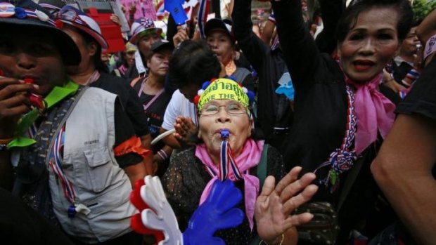 Anti-government supporters attend a rally and memorial for the children killed in recent bomb blasts in Bangkok.