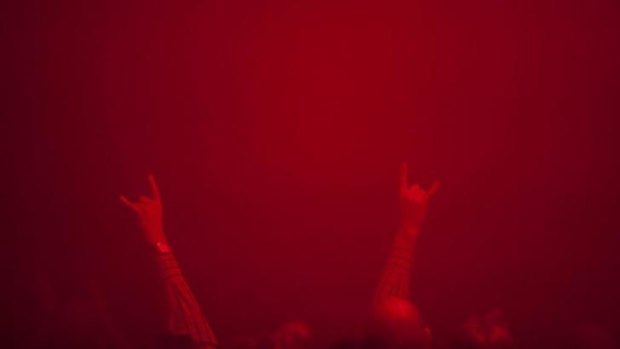 The crowd in the red mist at Sun O))).
