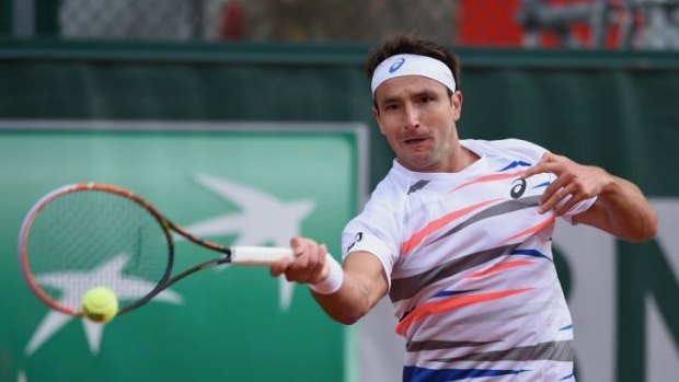 Marinko Matosevic returns to Dustin Brown of Germany.