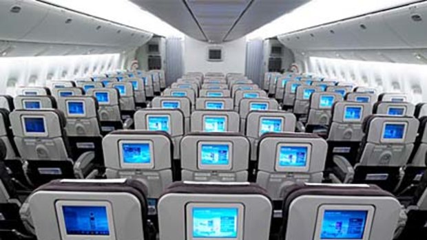 Korean Air economy class ... seatback touch screens have drawbacks.