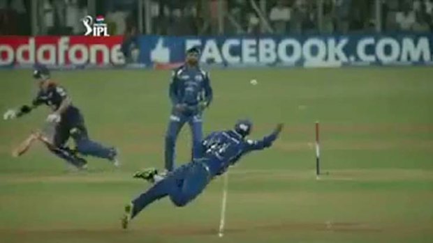 Flying through the air: Ricky Ponting.