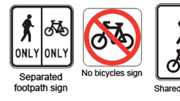 Signs indicating Queensland's bicycle rules.