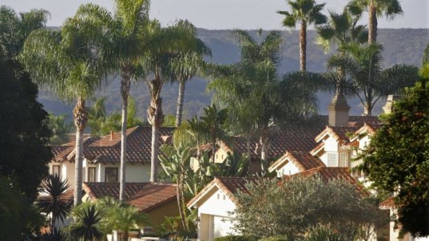 Tile-roofed houses are in the upscale San Diego gated community of Carmel Valley, where Jerry Rice and wife Janice Ruhter were harassed.