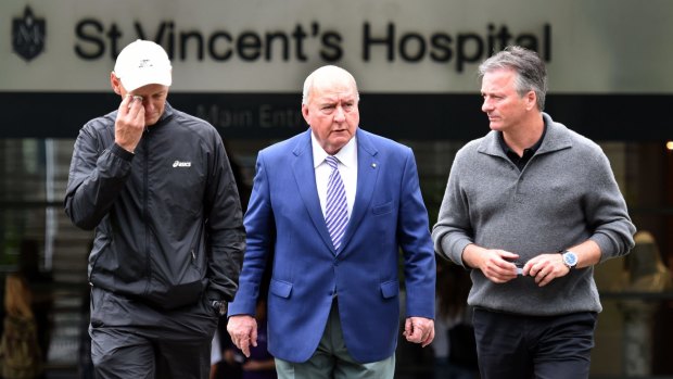 Steve Waugh and Alan Jones leave St Vincent's Hospital follow the death of Australian batsmen Phillip Hughes.
