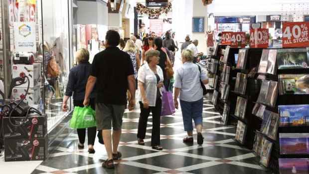 Shoppers search for a bargain at Westfield Woden during the end of year sales on Saturday, December 29. Some designer labels launched their end of year sales well in advance of the traditional December 26 starting date.