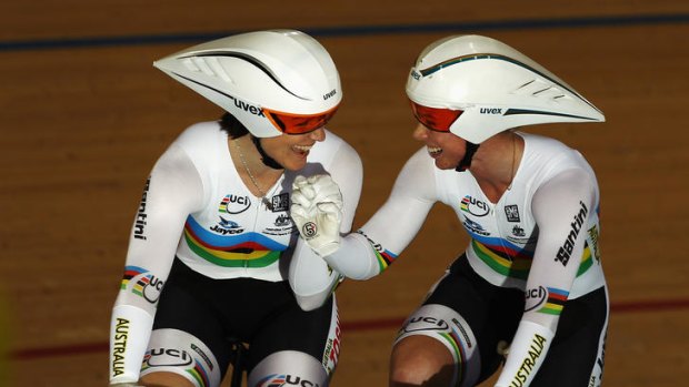 Early joy ... Anna Meares and Kaarle McCulloch of Australia celebrate setting a world record before Britain borke it in the final.
