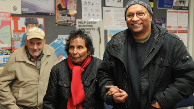Ivan and Catherine Fry are reunited with their son, Suresh, at Knox Police Station.