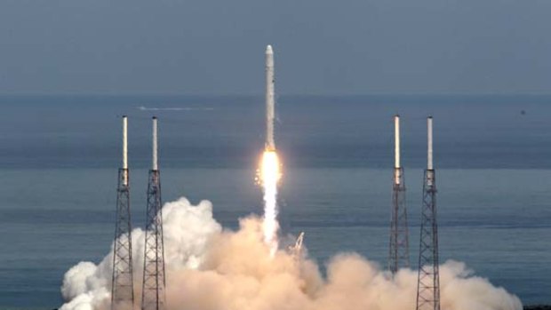 The SpaceX Falcon 9 rocket lifts off from Cape Canaveral .