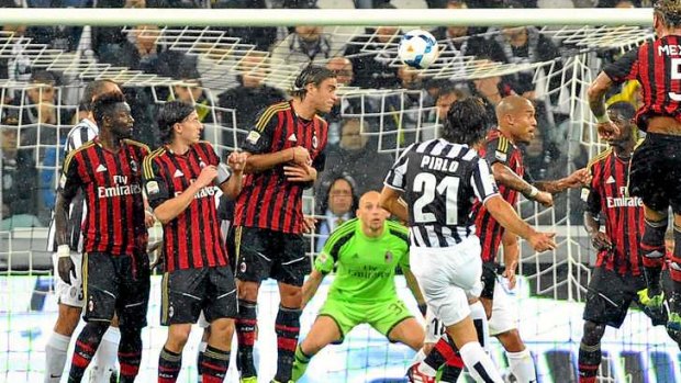 Juventus midfielder Andrea Pirlo scores from a free kick.