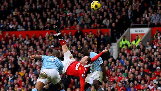 Spectacular ... Wayne Rooney scores an overhead kick against Manchester City.