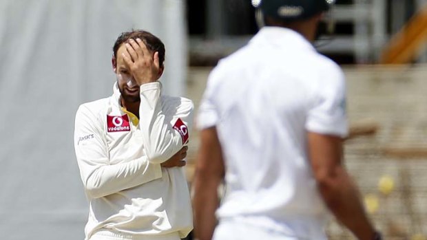 Offie day &#8230; Nathan Lyon shows the strain of failing to bowl Australia to a win over the Proteas.