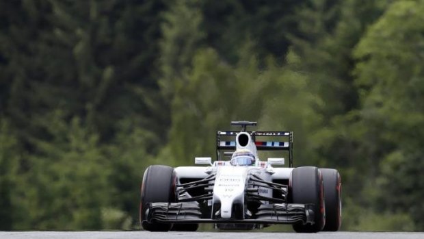 Williams driver Felipe Massa steers his car to pole position for the Austrian Grand Prix.