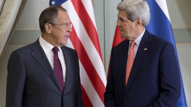 US Secretary of State John Kerry (right) talks with Russian Foreign Minister Sergey Lavrov in Paris, France.