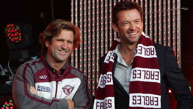 Manly coach Des Hasler with fan Hugh Jackman at the NRL Fan Day at Darling Harbour.