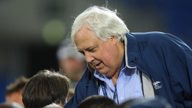 United CEO Clive Palmer talks to players before the start of the round 17 A-League match between Gold Coast United and the Central Coast Mariners at Skilled Park on February 22, 2012 in Gold Coast, Australia.