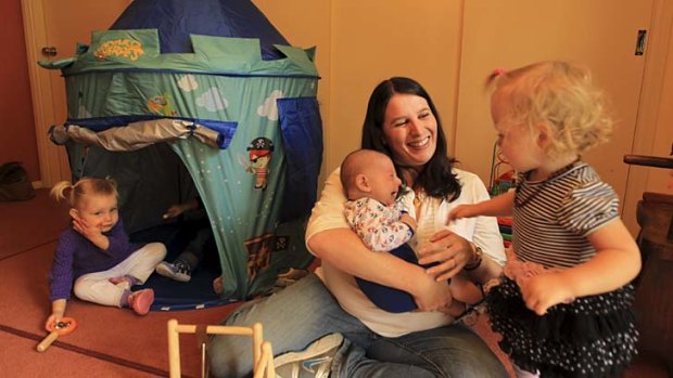 Worried about infection: Fenella Cios, director of Fenella's Family Daycare, with Ellie Graf, 2, nine-week-old son Oliver and Victoria Dale, 18 months.