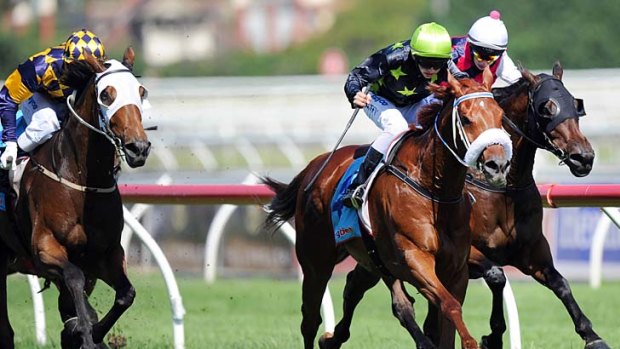 Jake Duffy rides Shout Out Loud to victory in the The 65 Roses Victoria Cup at Caulfield.