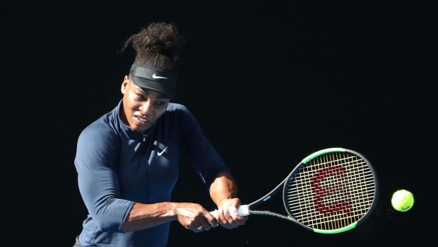 Serena Williams plays a backhand during a practice session