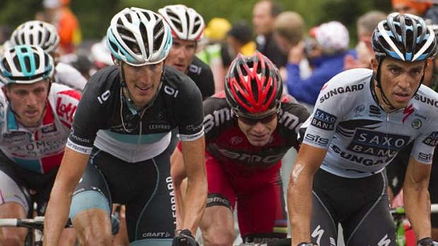 From left: Belgium's Jurgen Van den Broeck, Luxembourg's Andy Schleck, Luxembourg's national road champion Frank Schleck, Australia's Cadel Evans and Spain's three-time Tour de France winner Alberto Contador ride in the pack during the 189-km eighth stage.