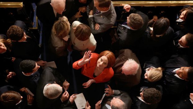 Julia Gillard signs autographs after addressing a joint meeting of the United States Congress on Capitol HIll in Washington, above.